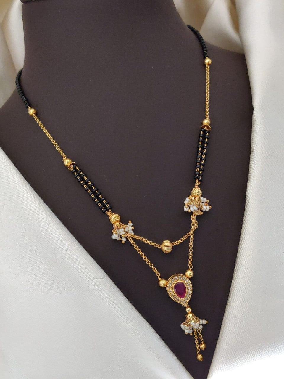 fancy mangalsutra dholki set- timeless elegance