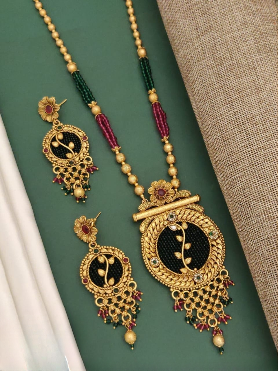 rajwadi opulence: long antique pendant set with earrings for majestic glamour